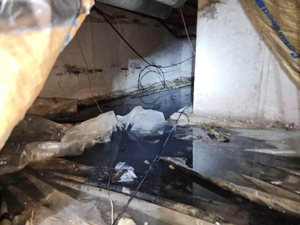 water damage in the crawlspace. crawlspace waterproofing. crawlspace damaged in brown county indiana. septic backup.